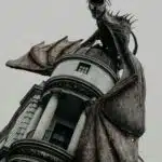 , shallow focus photo of dragon on gray building