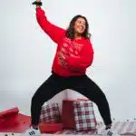 , woman in red crew-neck long-sleeved shirt