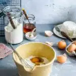 Good music , good mood and good quality of ingredients- you don’t need anything else to cook something delicious, Ok maybe would be good to have a good recipe too ;), brown mixing bowl with eggs and flour with whisk