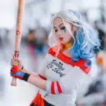 , woman wearing harley quinn costume
