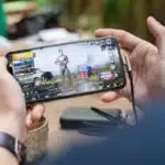 Playing Pubg Game On Smartphone, person playing PUBG mobile